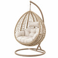 Fauteuil suspendu 105 x 105 x 195 cm en fibres tressées beige pour intérieur et extérieur couvert